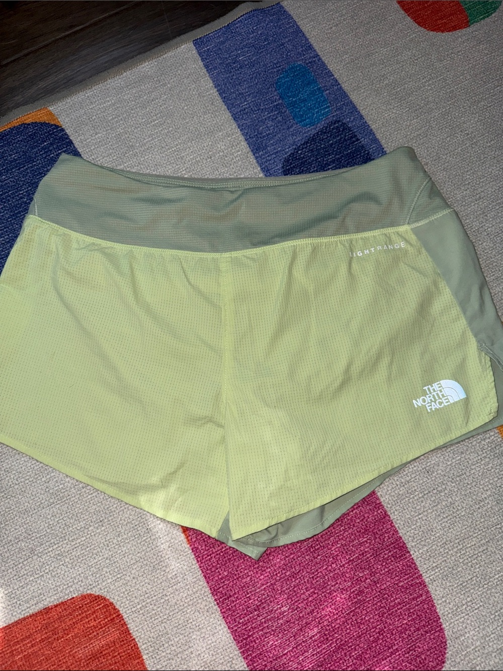 The North Face Women's Yellow Running Shorts with Gray/ green Waistband